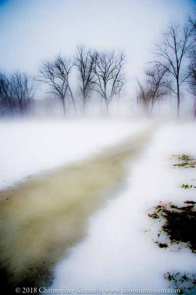 Snow melt in Bucks County field with mist