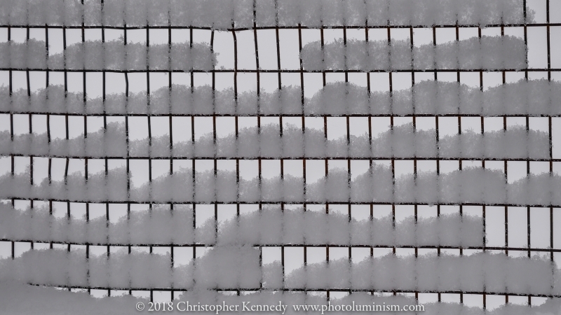 Rectangle wire fence with snow, Wide angle