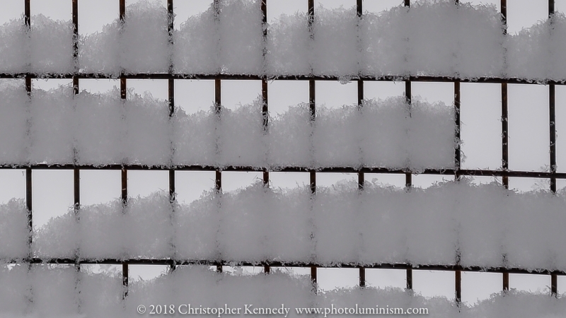 Rectangle wire fence with snow