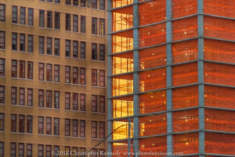 Orange netting around construction of high rise in Manahattan-DSC_7501151022